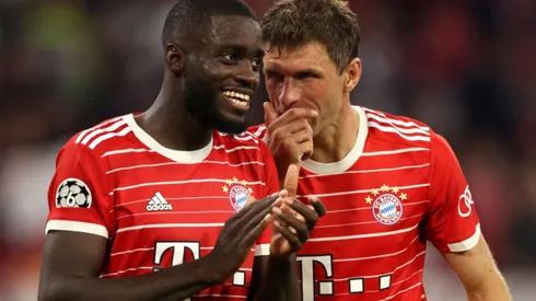 Dayot Upamecano and Thomas Muller of Bayern