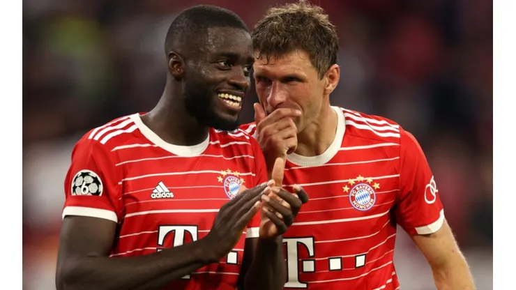 Dayot Upamecano and Thomas Muller of Bayern