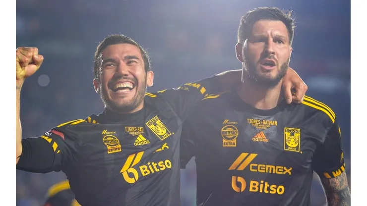 Juan Vigon with André-Pierre Gignac of Tigres UANL