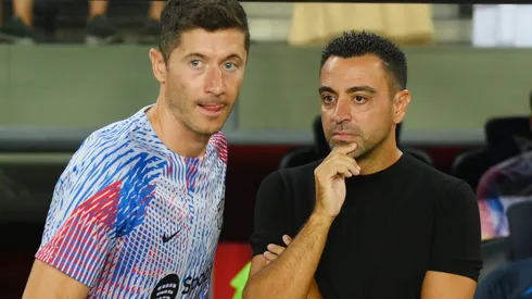 Robert Lewandowski and Xavi of Barcelona