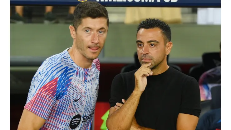 Robert Lewandowski and Xavi of Barcelona