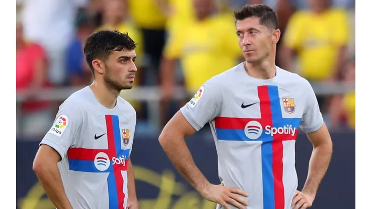Pedri and Robert Lewandowski of Barcelona