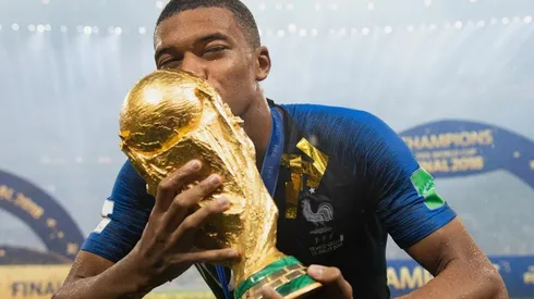 Kylian Mbappe of France celebrates with the World Cup Trophy