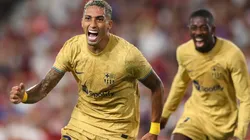 Raphinha celebrates his goal against Sevilla in the 2022-23 LaLiga season.