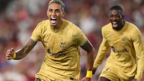 Raphinha celebrates his goal against Sevilla in the 2022-23 LaLiga season.