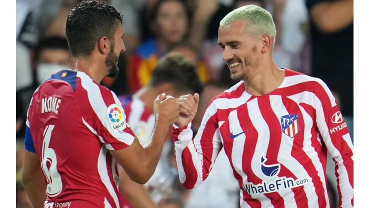 Koke and Antoine Griezmann of Atletico Madrid