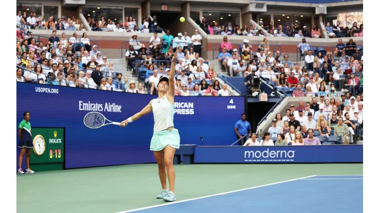 Iga Swiatek serves against Ons Jabeur during their US Open Women’s Singles Final