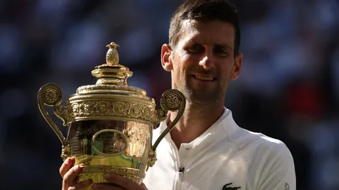 Novak Djokovic of Serbia with his 2022 Wimbledon trophy