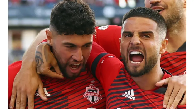Jonathan Osorio with Lorenzo Insigne of Toronto FC