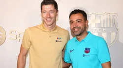 Robert Lewandowski (left) and Xavi Hernandez.