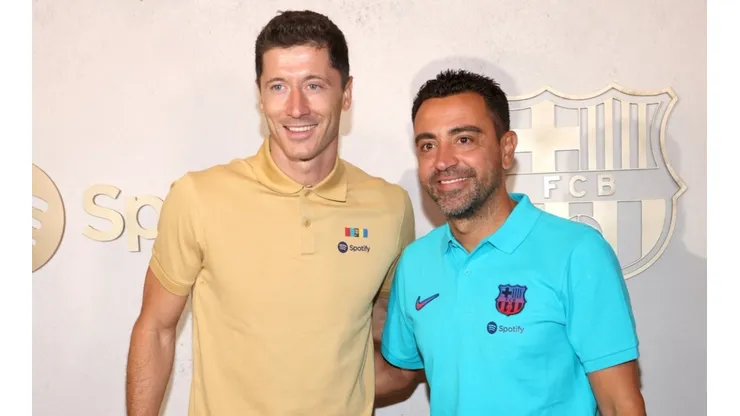 Robert Lewandowski (left) and Xavi Hernandez.