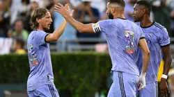 Karim Benzema of Real Madrid celebrates with Luka Modric