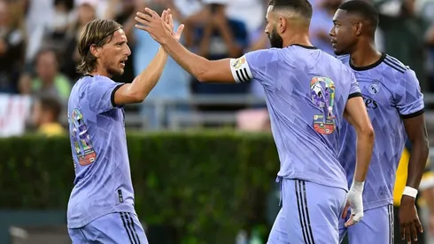 Karim Benzema of Real Madrid celebrates with Luka Modric