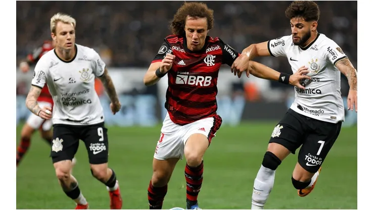 David Luiz of Flamengo competes for the ball with Yuri Alberto (R) of Corinthians