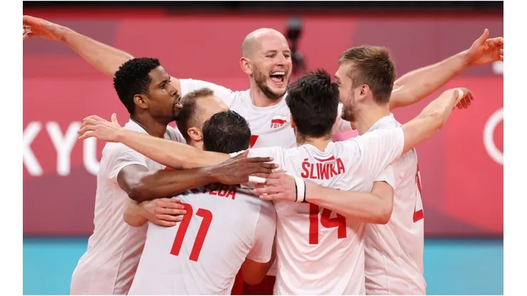 Bartosz Kurek of Team Poland reacts with team mates