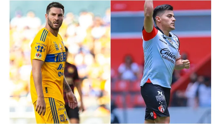 Andre-Pierre Gignac of Tigres UANL and Aldo Rocha of Atlas