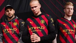 Manchester City unveil black and red striped away jersey