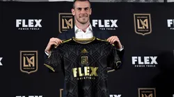 Forward Gareth Bale holds the Los Angeles Football Club jersey during a news conference after he was introduced at Banc of California Stadium on July 11, 2022 in Los Angeles, California. (Photo by Kevork Djansezian/Getty Images)-Not Released (NR)