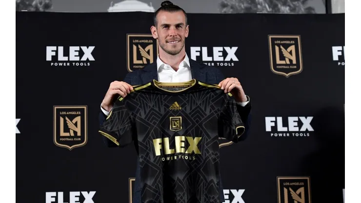 Forward Gareth Bale holds the Los Angeles Football Club jersey during a news conference after he was introduced at Banc of California Stadium on July 11, 2022 in Los Angeles, California. (Photo by Kevork Djansezian/Getty Images)-Not Released (NR)