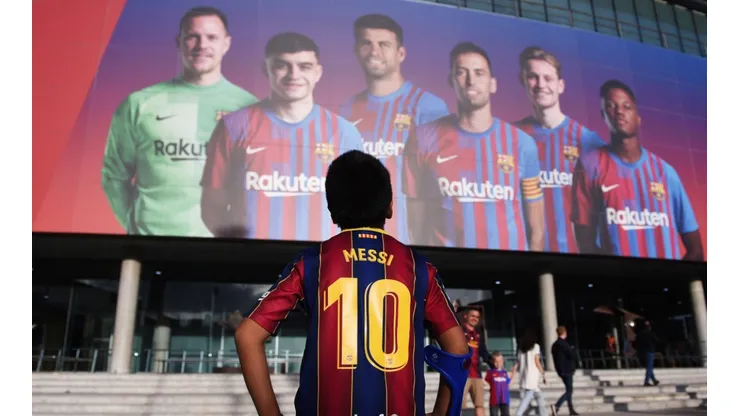 A Barcelona fan with a Lionel Messi printed shirt