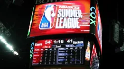 A scoreboard shows an NBA Summer League logo during a game