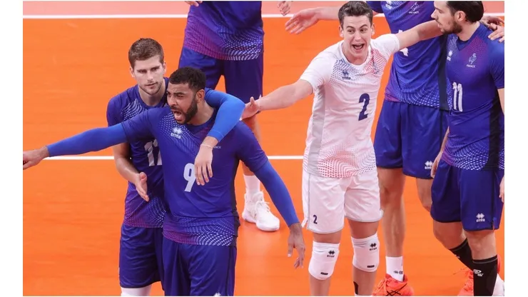 Earvin Ngapeth of Team France reacts with team mates