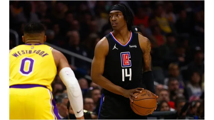Terance Mann of the LA Clippers and Russell Waestbrook of Los Angeles Lakers playing at the Crypto.com Arena