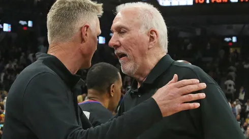 Head coach of the Golden State Warriors Steve Kerr greets San Antonio head coach Gregg Popvich