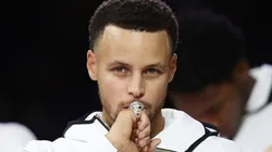 Stephen Curry of the Golden State Warriors kisses at his NBA Championship ring