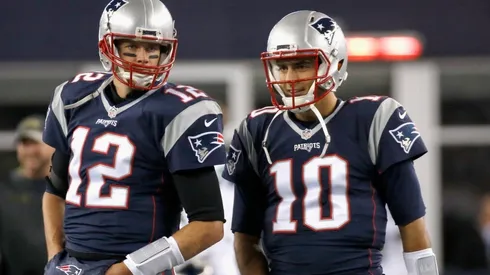 Tom Brady (left) and Jimmy Garoppolo during their time in New England.