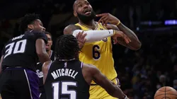 LeBron James of the Los Angeles Lakers reacts as he is stripped of the ball by Davion Mitchell of the Sacramento Kings