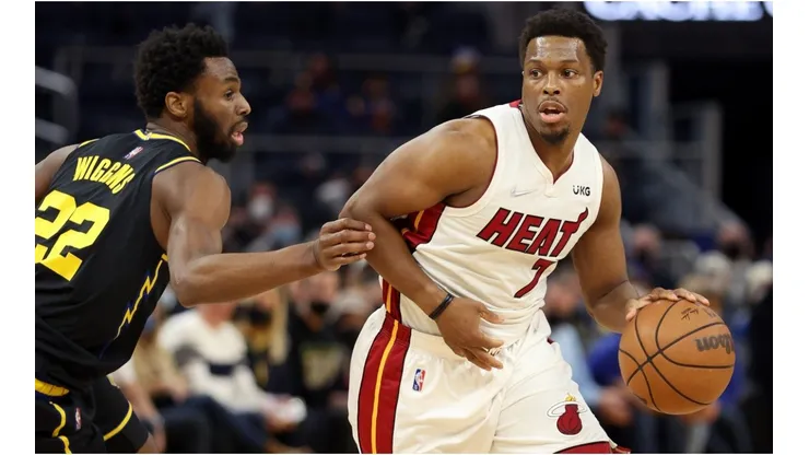 Kyle Lowry of the Miami Heat is guarded by Andrew Wiggins of the Golden State Warriors