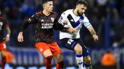 Enzo Fernandez of River Plate fights for the ball with Lucas Pratto of Velez