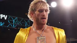 Logan Paul wears a Charizard Pokemon card chain as he enters the ring for his contracted exhibition boxing match against Floyd Mayweather at Hard Rock Stadium on June 06, 2021 in Miami Gardens, Florida.