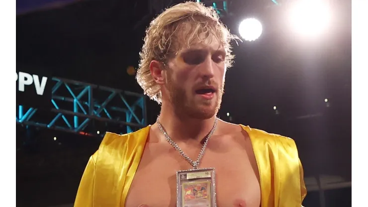 Logan Paul wears a Charizard Pokemon card chain as he enters the ring for his contracted exhibition boxing match against Floyd Mayweather at Hard Rock Stadium on June 06, 2021 in Miami Gardens, Florida.