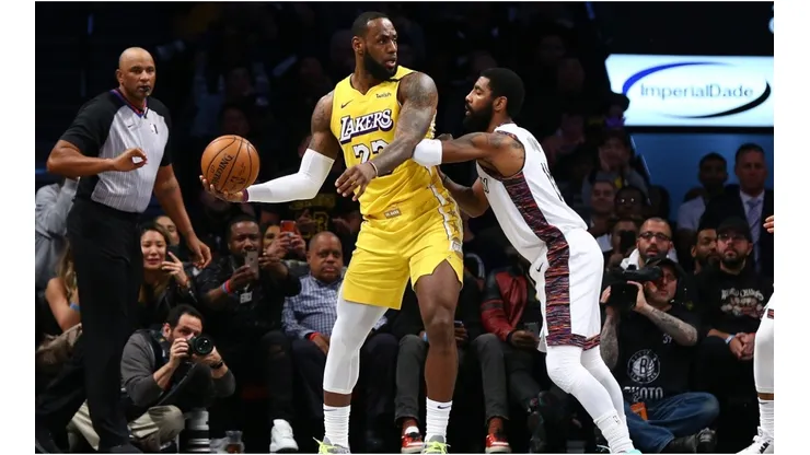 Kyrie Irving guarding LeBron James