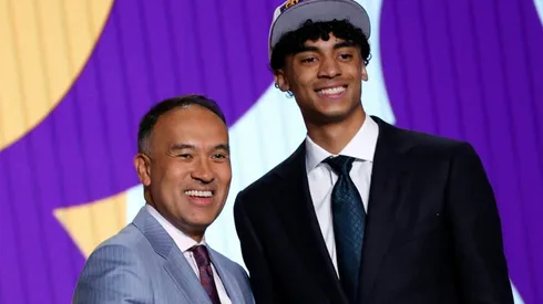 Deputy commissioner Mark Tatum and Max Christie as Los Angeles Lakers player