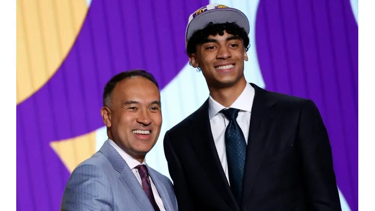 Deputy commissioner Mark Tatum and Max Christie as Los Angeles Lakers player