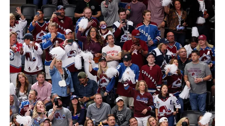 Colorado Avalanche fans celebrate in the stands during the third period in Game Two of the 2022 NHL Stanley Cup Final against the Tampa Bay Lightning at Ball Arena on June 18, 2022 in Denver, Colorado.