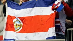 Costa Rican fans hold their contry's flag