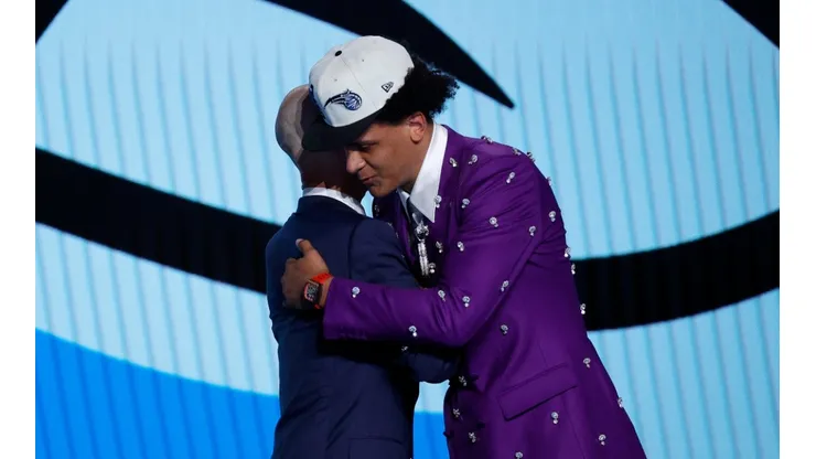 Adam Silver hugs Paolo Banchero as he was selected with the first-overall pick in the 2022 NBA Draft.