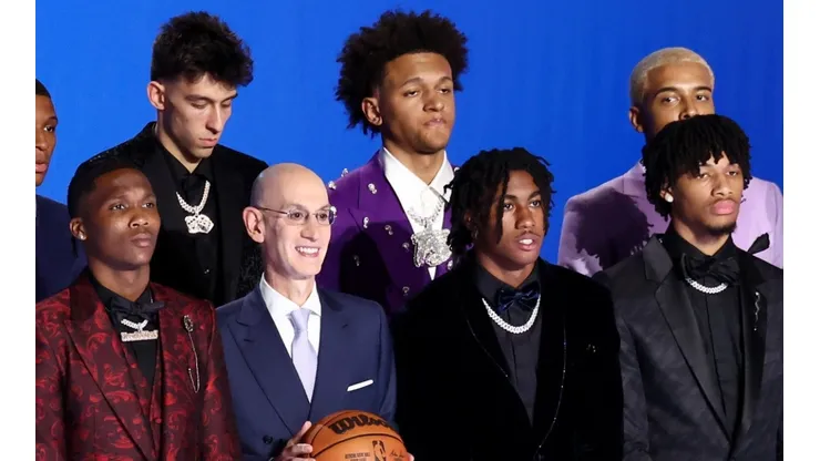 NBA commissioner Adam Silver (C) with the 2022 NBA Draft class