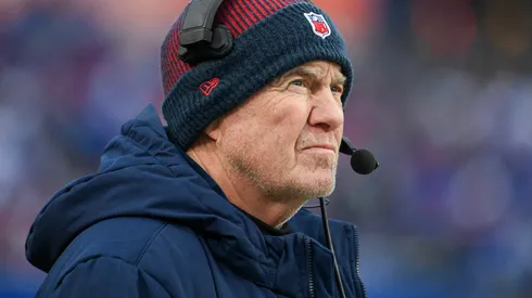 Head coach Bill Belichick of the New England Patriots looks on during the first half of a game against the Buffalo Bills at Highmark Stadium on December 31, 2023 in Orchard Park, New York.