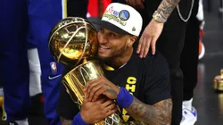 Gary Payton II with the Larry O'Brien trophy as champion