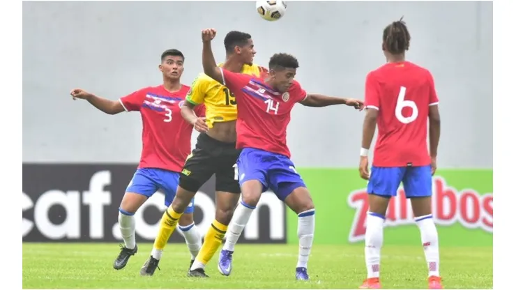 Costa Rica players in the game against Jamaica
