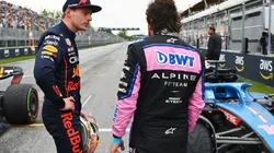 Pole position qualifier Max Verstappen of Red Bull Racing talks with Second placed qualifier Fernando Alonso of Alpine