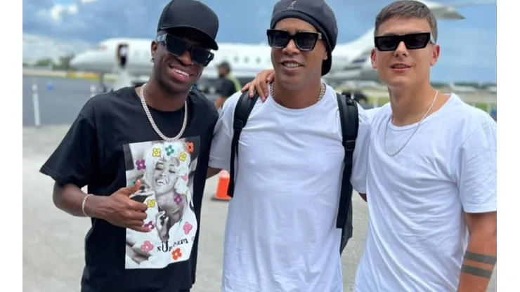 Vinicius Jr (left) with Ronaldinho and Dybala