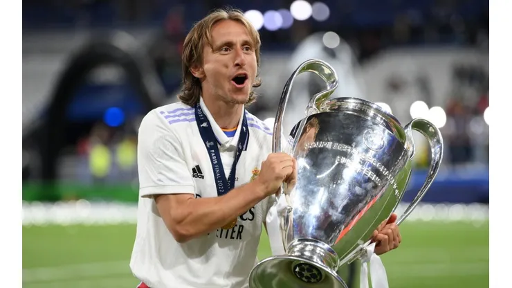Luka Modric of Real Madrid celebrates with the UEFA Champions League Trophy