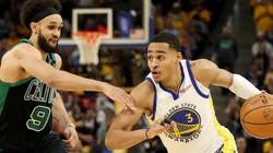 Jordan Poole of the Golden State Warriors and Derrick White of the Boston Celtics