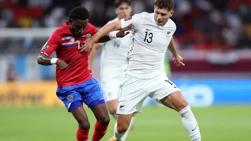 Keysher Fuller of Costa Rica battles for possession with Liberato Cacace of New Zealand